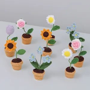 Handmade crochet potted plants featuring sunflowers, roses and tulips for home decor