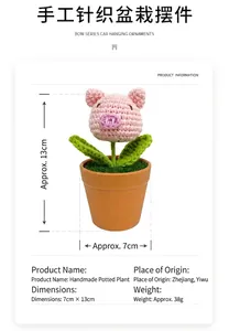 Detail of handmade crochet pink pig plant with size specs 7cm x 13cm for car decor