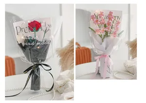 Detailed close-up of handmade crochet flower bouquet with LED lights and gift packaging