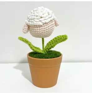 Detail of handmade crochet bunny rabbit flower in a pot for tabletop decoration