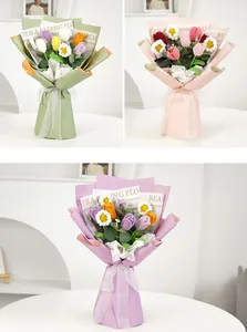Detailed view of handmade crochet tulip and daisy bouquets in elegant paper packaging