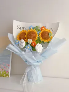 Detail of hand-knitted sunflower bouquet with blue packaging and Summer Flower card