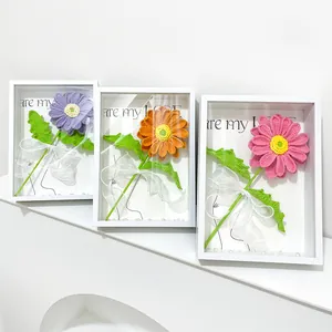 Handmade crochet gerbera flowers in white shadow box frame for elegant home decor