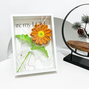 3D shadow box frame with handmade crochet orange gerbera and heart greeting card