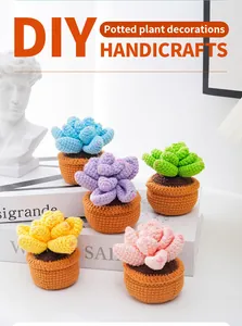 Close-up of five colorful crochet succulent plants in mini pots for home office decor