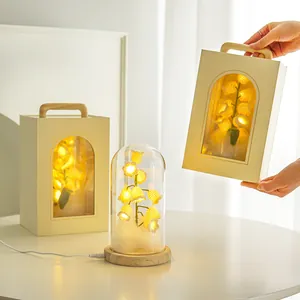 Luz nocturna de lirio de los valles de ganchillo a mano en caja de regalo con base de madera