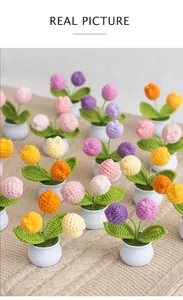 Detail of handcrafted crochet mini tulip potted plants in various vibrant pastel colors
