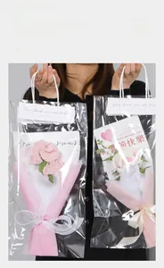 Handcrafted crochet tulip bouquet in clear gift bag with pink ribbons and card