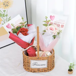 Handmade knitted carnation bouquet in a rattan basket with Mother's Day greeting card