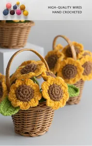 Close-up of hand-crocheted sunflower in a mini woven basket with premium yarn detail