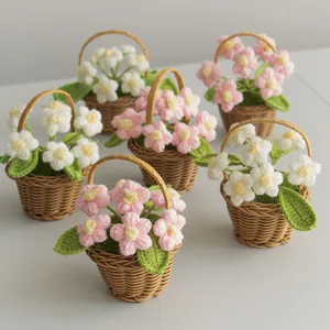 Handmade crochet puff flower basket in pink and white for home office desk decoration