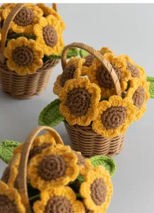 Detailed view of handmade crochet sunflower in a mini wicker basket for home decor