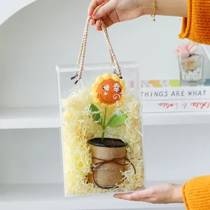 Handmade knitted sunflower plant in pot with gift bag, creative crochet desk ornament