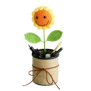 Handmade crochet sunflower pencil holder with a smiley face and rustic jute rope finish