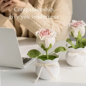 Handmade crochet pink rose in white ceramic pot with Love Is Eternal ribbon decoration