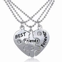 Detailed view of silver heart puzzle necklaces with BEST FRIENDS FOREVER engraving