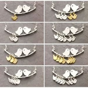 Love birds necklace with small birds on branch pendants in silver and gold tone