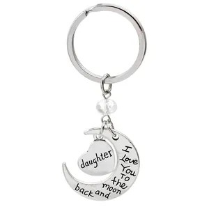 Silver I Love You To The Moon And Back keychain with heart and crescent moon charms