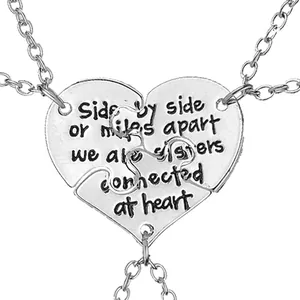 Three-piece silver heart puzzle necklaces with Best Friends engraved sentiment