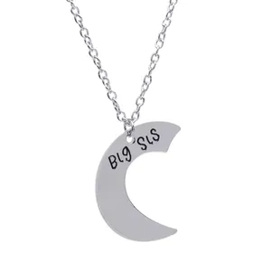 Silver crescent moon necklace with Big Sis engraving on a classic link chain