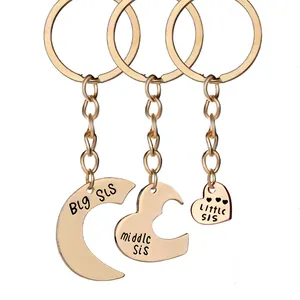 Driedelige goudkleurige zussen puzzel hart sleutelhanger set met Big Middle Little Sis tekst