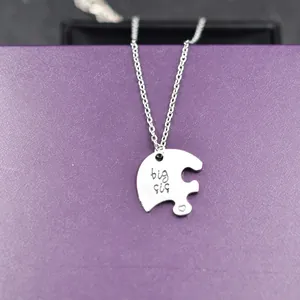 Three-piece stainless steel puzzle heart necklace set for sisters with big sis engraving