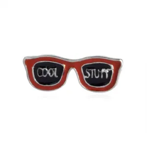Red enamel sunglasses brooch featuring cool stuff lettering on a white background