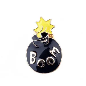 Cartoon enamel boom bomb brooch pin with yellow explosion sparks and black finish