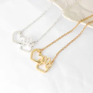 Fashion heart and paw print pendant necklace in gold and silver finish for women