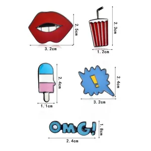 Detailed size chart for cartoon enamel pins featuring red lips and pop art icons