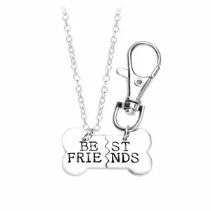 Silver best friends dog bone pendant set featuring split necklace and keychain set