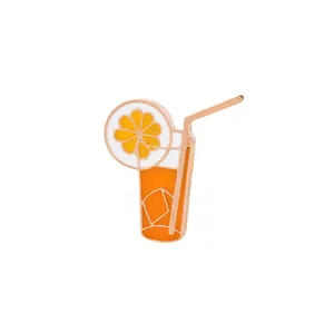 Cartoon orange juice enamel brooch with straw and fruit slice in gold metal finish
