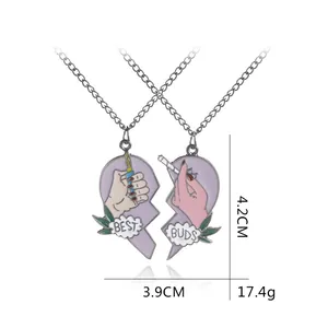 Collana Best Buds a cuore diviso con ciondoli a forma di sigaretta e accendino