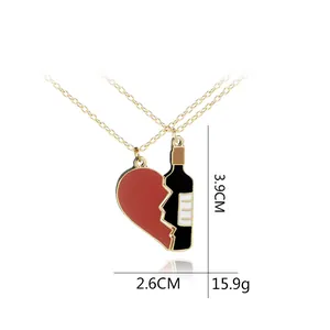 Detailed view of wine bottle and heart pendant necklace set with size measurements