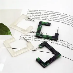 Minimalist geometric square acetate earrings in marble white and deep green resin patterns