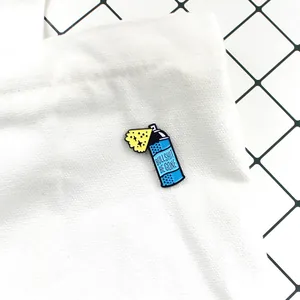 Detailed enamel pin with 'Bullshit Be Gone' spray can design on a white canvas bag