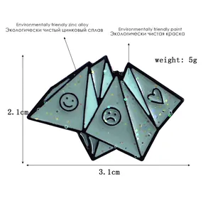 Blue origami folding enamel pin with smiley faces and heart patterns 2.1cm x 3.1cm