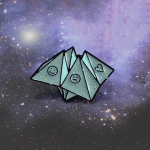 Creative origami enamel brooch with blue smiley faces on a galaxy star background