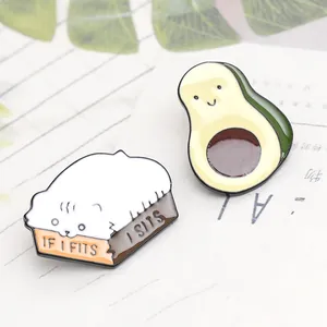 Cute avocado and white cat in box enamel pin set on a decorative background