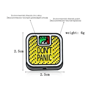 Don't Panic vintage scale enamel pin badge made of yellow zinc alloy with retro design