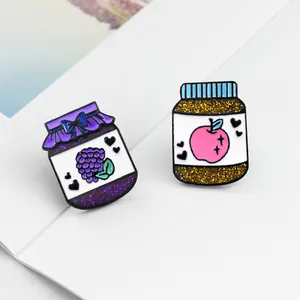 Cartoon fruit jam jar enamel pins with glitter details and sweet purple grape designs