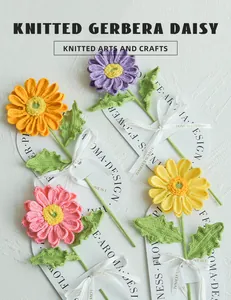 Macro detail of hand-knitted colorful Gerbera Daisies with Love Is Eternal ribbon decoration
