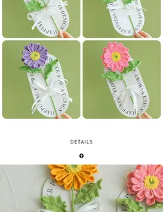 Macro view of handmade crochet daisy flower with delicate knitted petals and ribbon