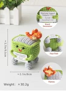 Detail of green crochet dumpster fire plush with emotional support sign and flame
