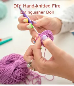 Macro shot of purple yarn and metal crochet hook for DIY fire extinguisher doll making