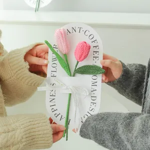 Handmade crochet tulips in pink and rose red with elegant ribbon and gift card packaging