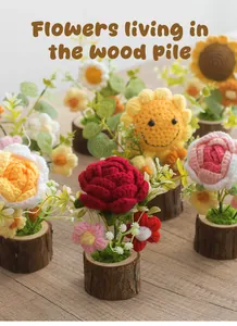 Detail of handmade crochet flowers on natural wood base including sunflowers and roses
