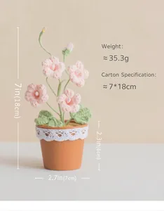 Detailed view of handmade crochet pink freesia plant in pot with dimensions and weight