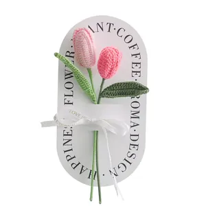 Handmade crochet pink tulips with Love Is Eternal ribbon on decorative gift card