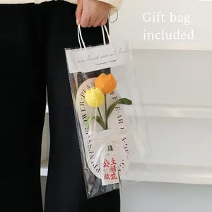 Handmade crochet tulip flower bouquet set in a gift bag with yellow and orange yarn flowers